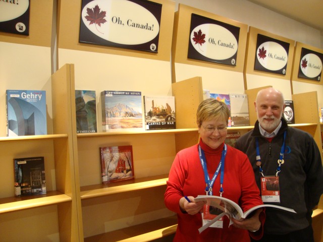 Dace (Sr. Librarian) & Greg (Chief Librarian) reading a BC book at the RPL's International Living Room
