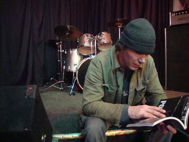 Glen reads a BC book between sets