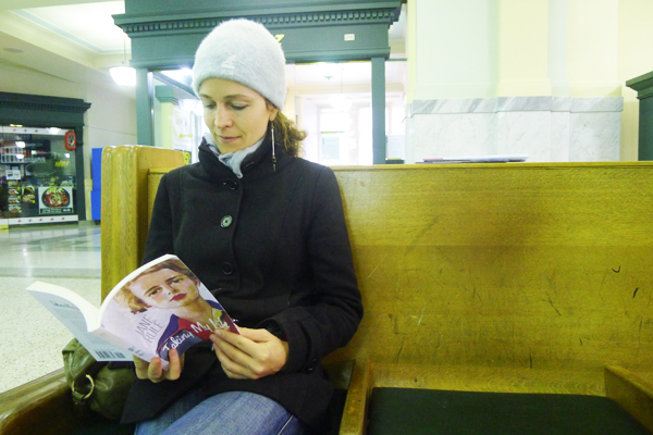 Amanda Reading a BC Book While waiting for her bus, Amanda reads a BC book at the Pacific Central Station in Vancouver.